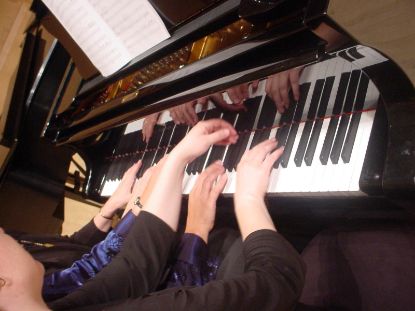 Picture of 2nd year through High School-60-minute Piano lessons  